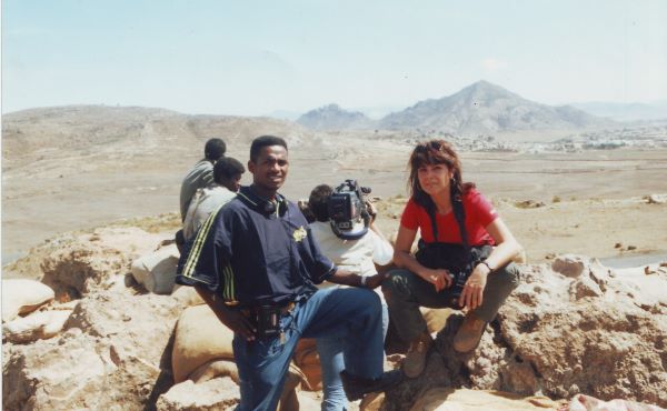 Reporter for Setit in Senafe front line in August 2000 with a Turkish journalist